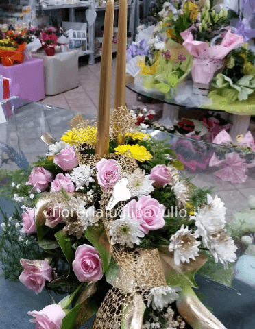 centrotavola con candele fiori misti anche su richiesta